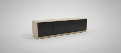 A long modern sideboard or credenza with a light natural wood frame and four black cabinet doors, shown on a clean light gray studio background.