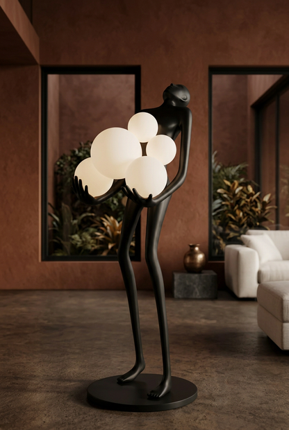 Embrace globe sculptural floor lamp in a terracotta interior