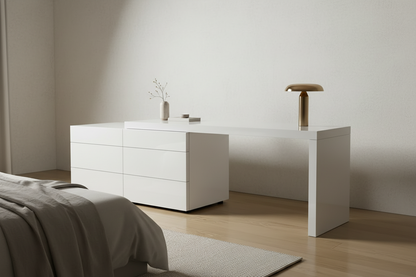 Gloss white six-drawer waterfall dresser in a bright contemporary bedroom