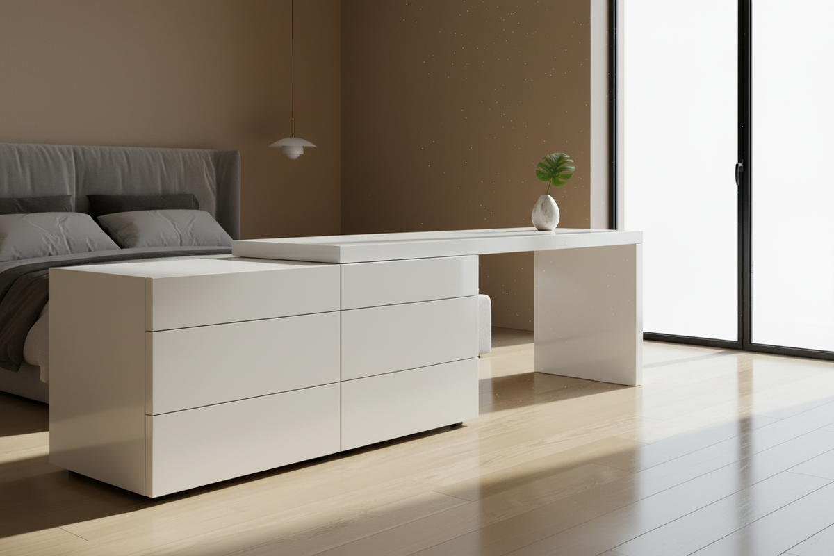 Gloss white six-drawer waterfall dresser beside a large black aluminium window