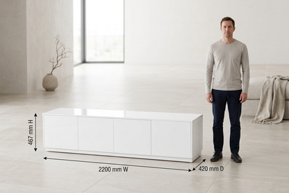 Gloss white TV unit with standing adult for scale and dimensions 2200 mm wide, 420 mm deep and 467 mm high
