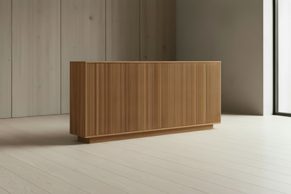 Three-quarter view of a genuine natural oak four-door half-round fluted sideboard