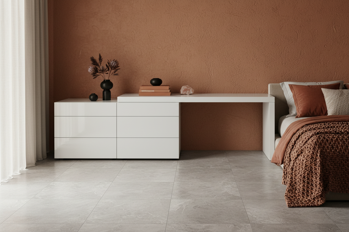 Gloss white six-drawer waterfall dresser styled in a terracotta bedroom