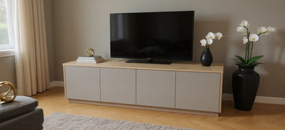 TRENZY Spaces Lux TV stand in light wood and grey with a minimalist design, supporting a flat-screen television.