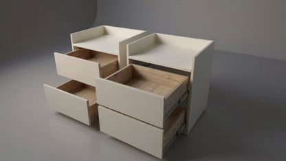 TRENZY Spaces modern luxury bedside pedestals in cream with two drawers and raised side panels, shown as a pair.
