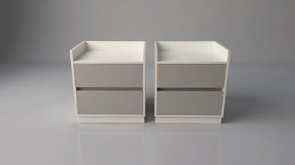 TRENZY Spaces modern luxury bedside pedestal pair with two drawers, featuring a white frame and grey drawer fronts.